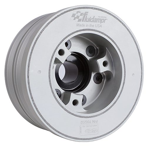A white wheel on a white background with a Ford 5.0L Coyote engine.