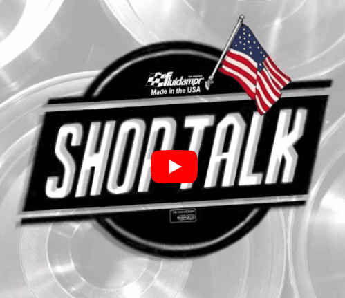 Logo of "shop talk" with an American flag, indicating it is made in the USA, displayed on a swirling grey background with a YouTube play button overlay.