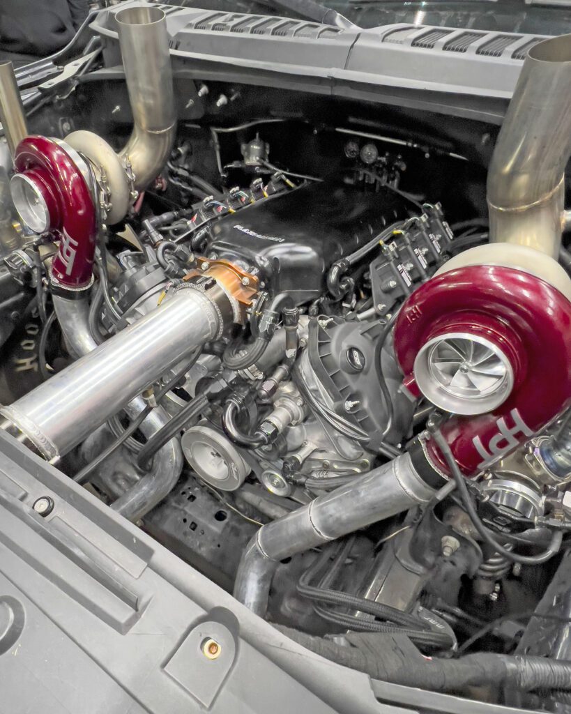 Fluidampr performance damper installed on a twin turbo Ford 5.0L Coyote.